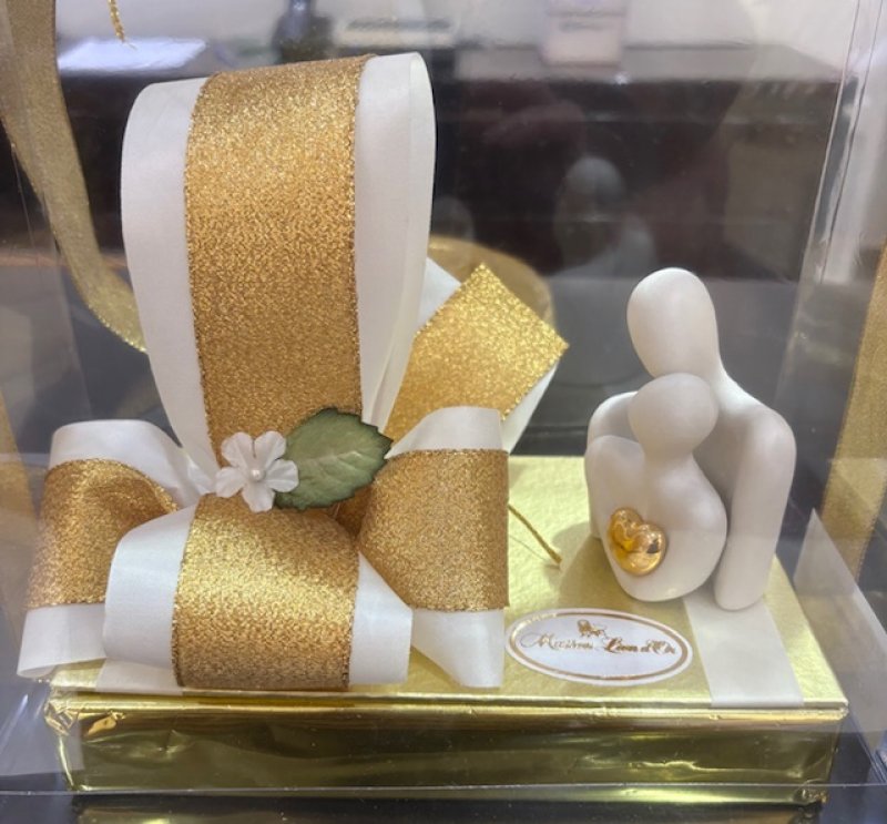 Pareja de ceramica con corazon